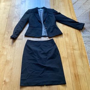 Black pinstripe Tahari suit skirt and blazer
